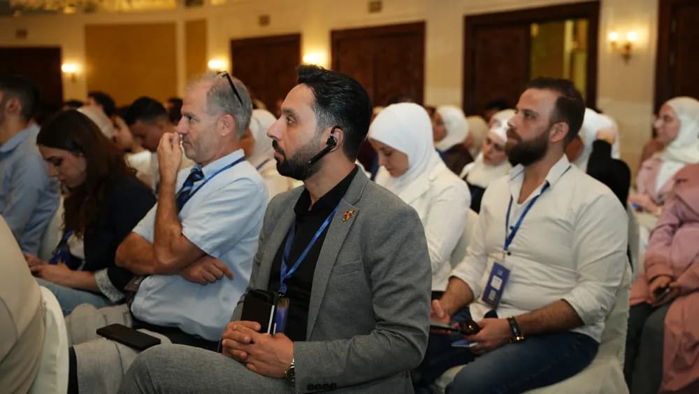 Attendees following the session